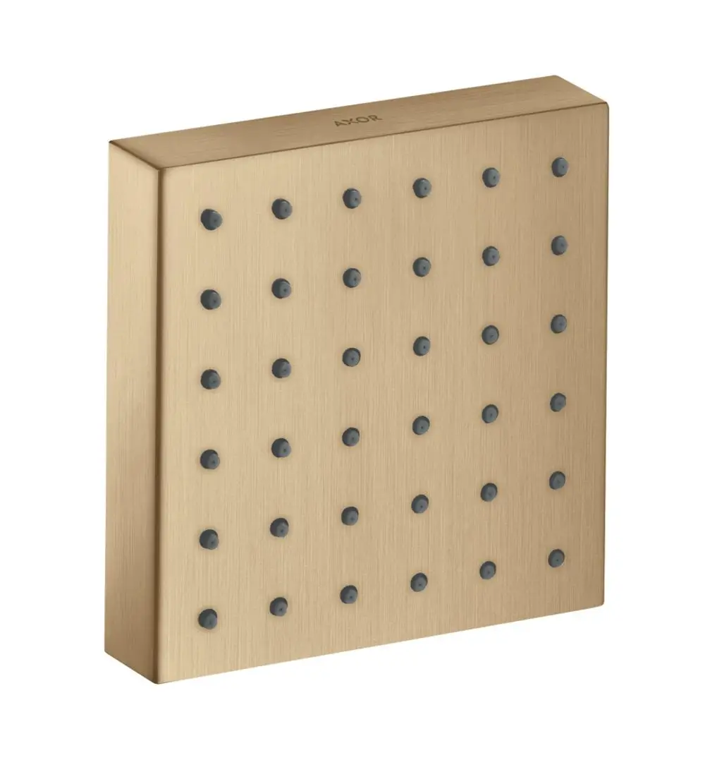 Brausesystem von AXOR mit quadratischem Design, Effektauslassrohre in Schwarz, montiert auf einer flachen, gebürsteten Bronzeplatte.